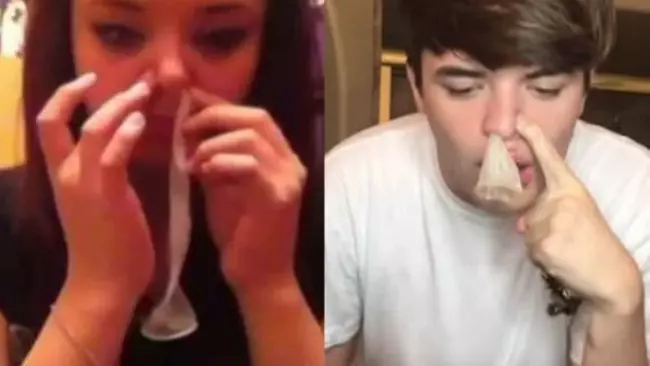 La sfida in cui bisogna aspirare un preservativo dal naso Alcuni ragazzi praticano la Condom Snorting Challenge