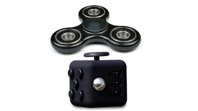 I tools che compongono l'Ultimate Fidgeters Bundle Lo Stress block e lo Stress Spinner