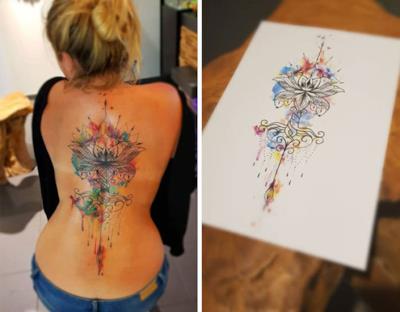 un disegno astratto tatuato sulla schiena - Tatuaggi per la spina dorsale, i più belli per la tua schiena