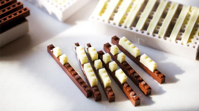 Lego al gusto cioccolato bianco, fondente, al latte e fragola Lego edibili progetto di un designer