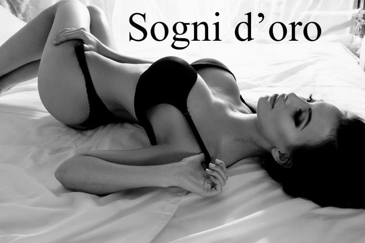Una ragazza in lingerie sdraiata su un letto - Immagini sexy per il buongiorno, buon compleanno, buonanotte e buona domenica