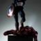 Captain America mostra la testa di Iron Man dopo averlo battuto