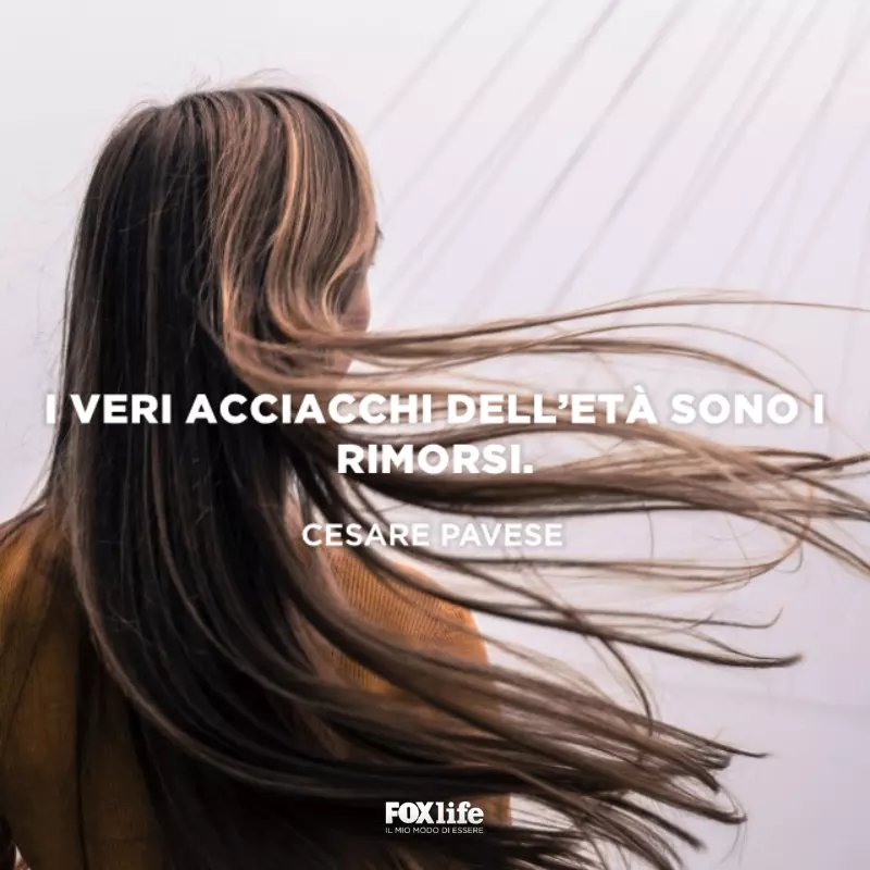 Frase sul rimorso Ragazza di spalle con i capelli al vento
