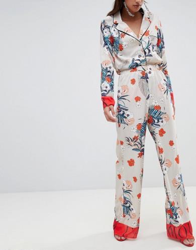 Pantaloni palazzo beige a fiori per donna
