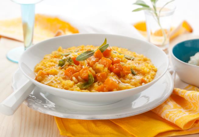 Risotto alla zucca con brodo vegetale, vino bianco e parmigiano Risotto alla zucca