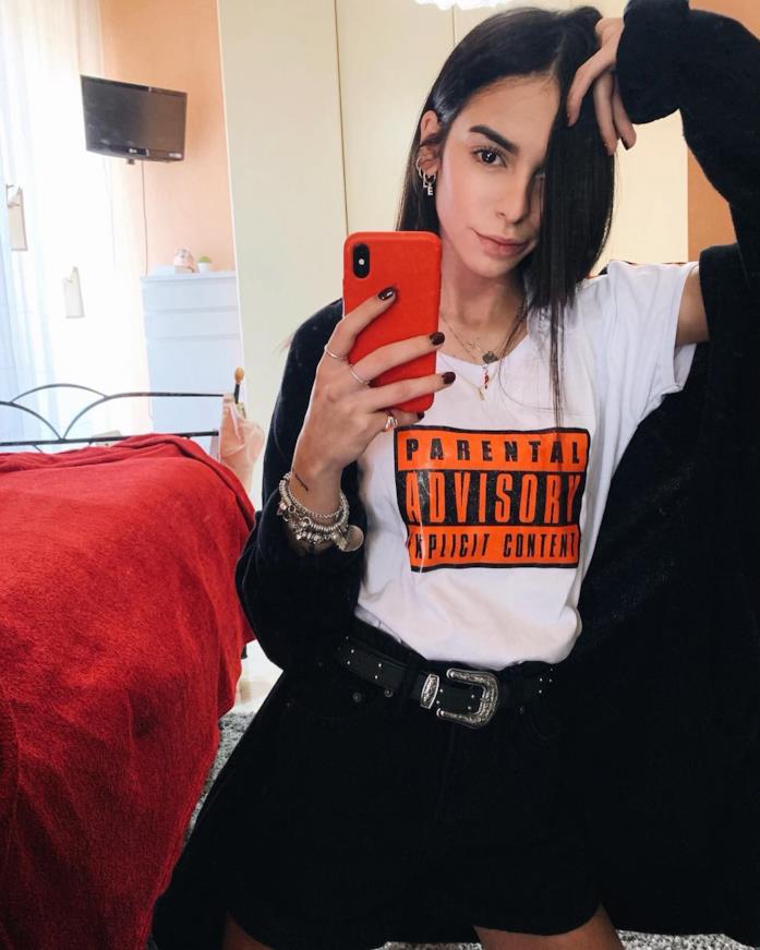 Elisabetta Laterza Elisabetta Laterza con t-shirt e e shorts neri