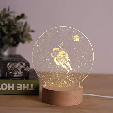 Lampada da tavolo con astronauta