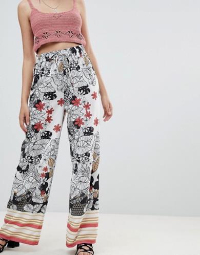 Pantaloni taglio palazzo con coulisse in vita a fiori