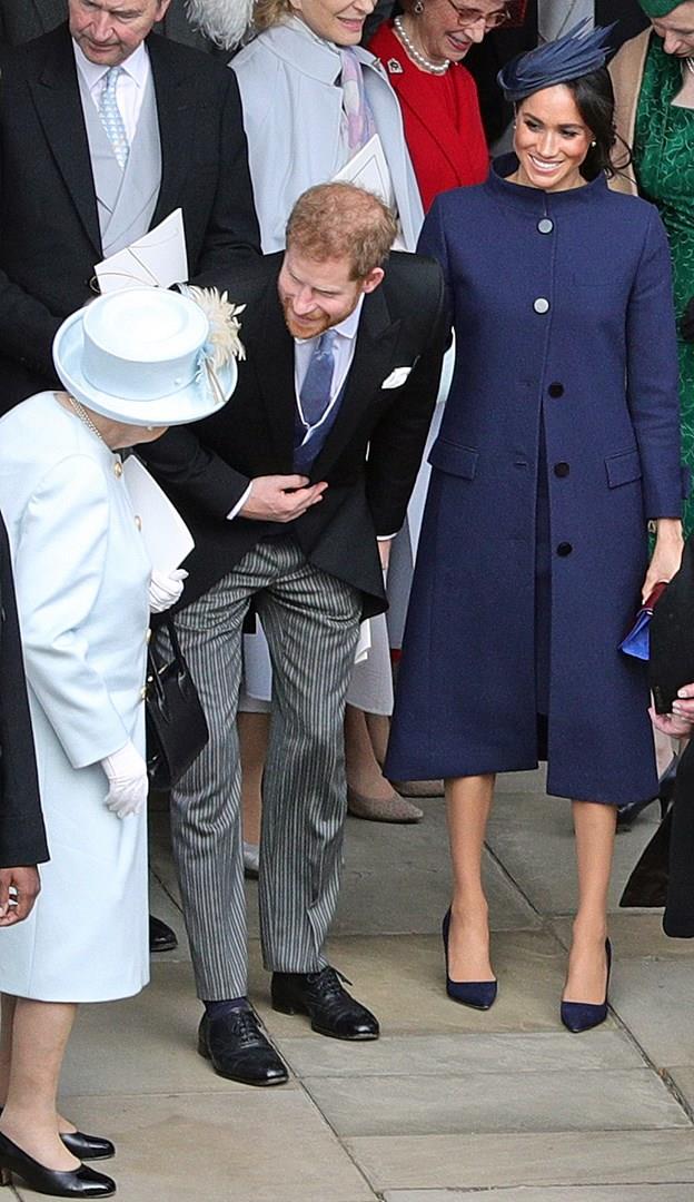 Meghan Markle è incinta Meghan Markle con un cappotto ampio