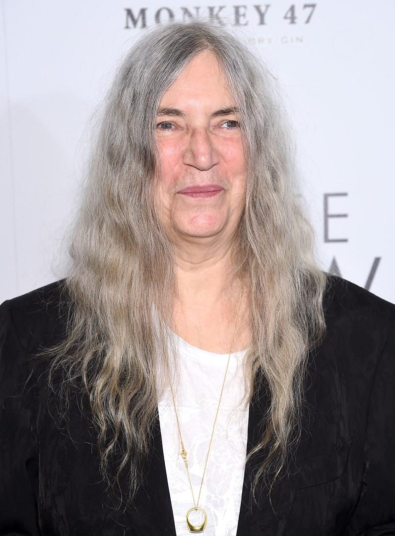 La sacerdotessa del rock, Patti Smith Primo piano di Patti Smith, che sorride