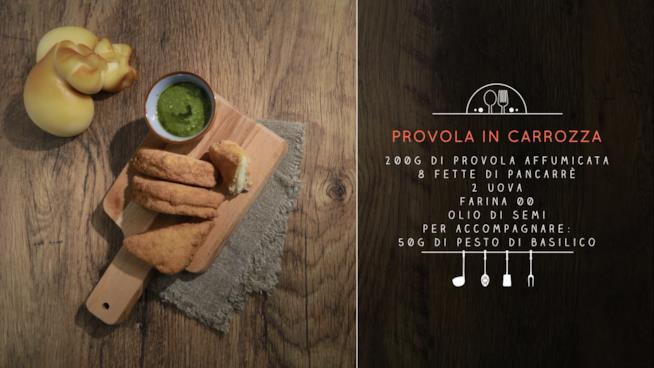Provola in carrozza impanata e fritta con accompagnamento di pesto Provola in carrozza