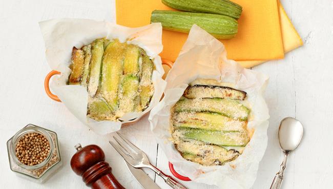 Parmigiana di zucchine: la ricetta al forno con scamorza e prosciutto Parmigiana di zucchine