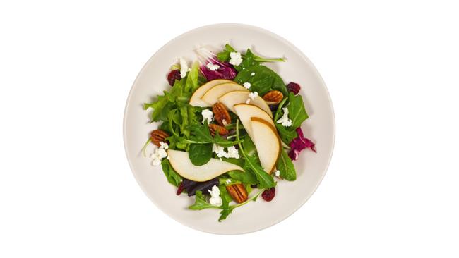 Insalata di spinaci crudi con pere, noci, mirtilli e fiocchi di latte Insalata di spinaci crudi