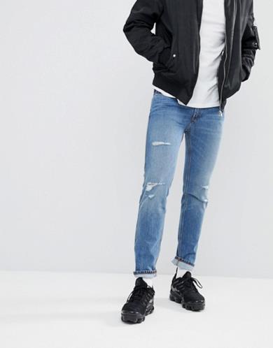 Jeans skinny blu elasticizzati effetto invecchiato