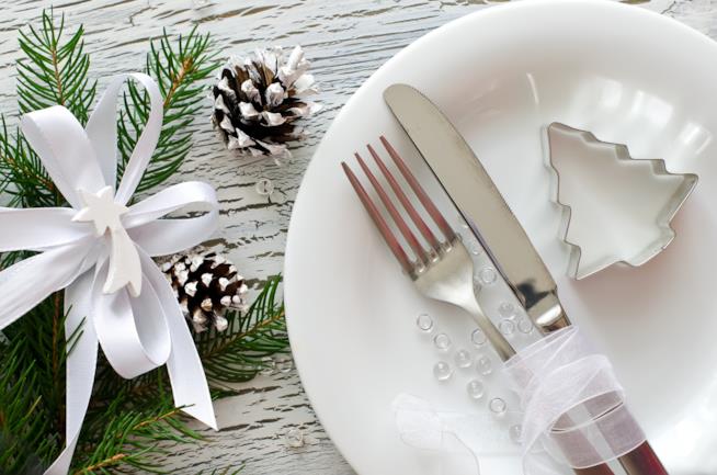 Ricette per il pranzo di Natale Piatto, posate e decorazioni per il pranzo di Natale