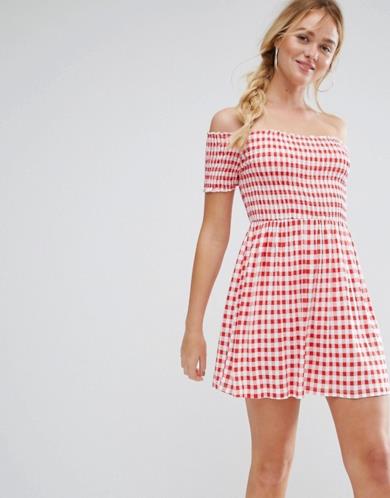 Vestito con scollo a barca a quadretti