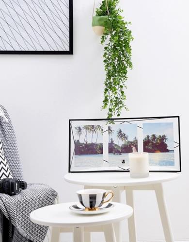 Cornice per fotografie tripla a forma di prisma