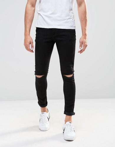 Jeans super skinny con strappi alle ginocchia