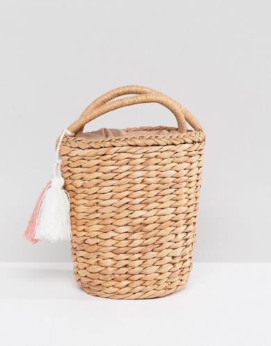 Borsa sferica in paglia con nappine