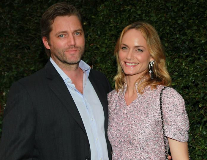 Vita privata e successi di Amber Valletta Amber Valletta con il secondo marito Chip McCaw