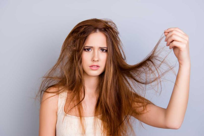 capelli secchi: i rimedi una ragazza con la chioma secca