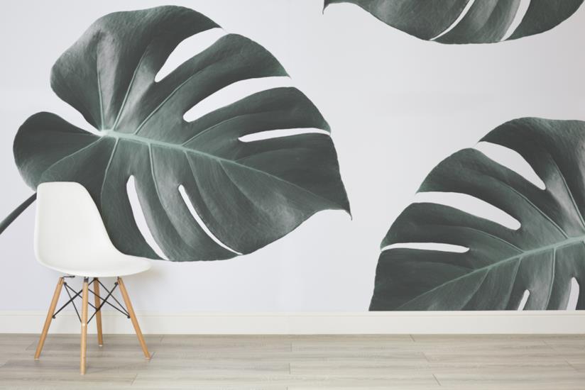 Lo stile jungle veste la casa di verde, portando freschezza e colore anche nella brutta stagione Parete di casa rivestita con wallpaper in puro stile jungle