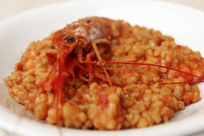 Fregola con gamberi e pomodori Fregola con gamberi e pomodori