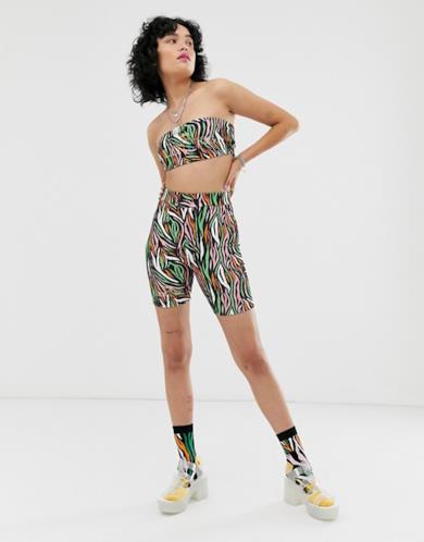 Leggings corti in coordinato con stampa zebrata e logo ricamato