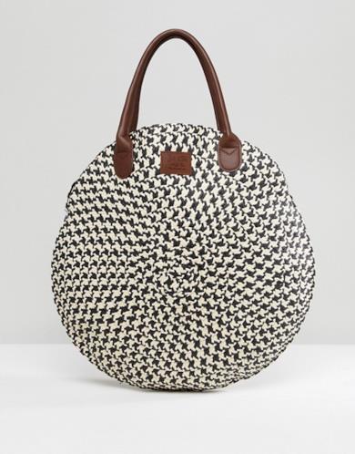Borsa di paglia rotonda bianca e nera
