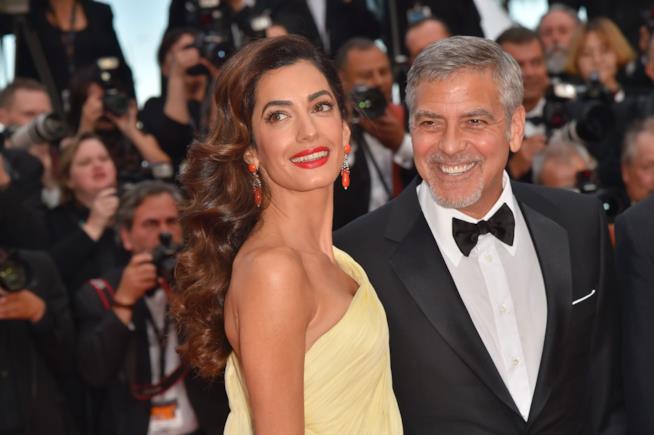 George Clooney e Amal, come si sono conosciuti? Primo piano di George Clooney e Amal