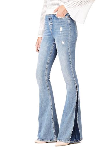 Jeans a zampa colore contrasto