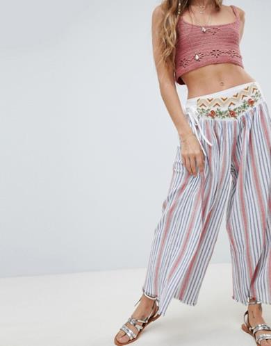 Pantaloni comodi a righe con fondo ampio