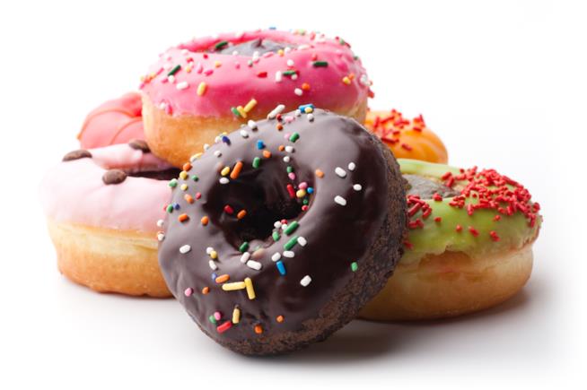 Donuts americane con glassa al cioccolato Donuts americane glassate e decorate