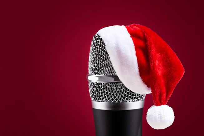 Le canzoni di Natale Microfono e cappellino di Natale