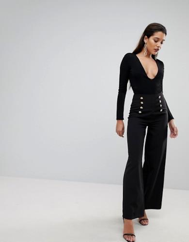Pantaloni sartoriali con fondo ampio e bottone oro