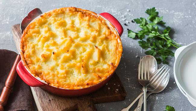 Parmigiana di patate: la ricetta con besciamella, mozzarella e prosciutto Parmigiana di patate