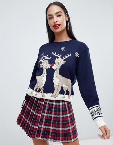 Maglione natalizio con renne che si baciano