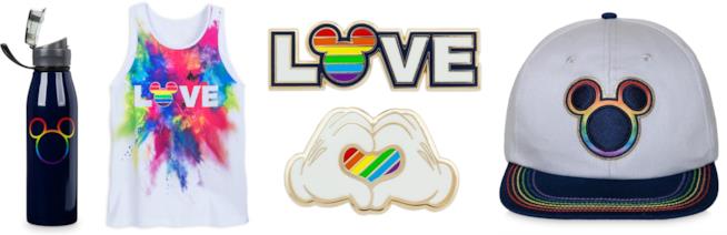 Prodotti della Mickey Rainbow Collection di Disney Una borraccia, una canottiera, una spilla ed un cappello della Mickey Rainbow Collection