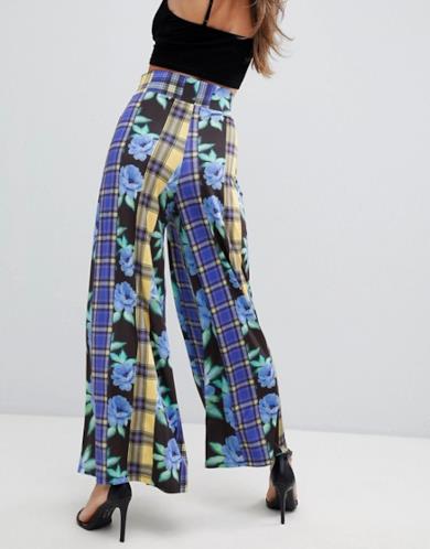 Pantaloni da donna a fiori e tartan, taglio palazzo
