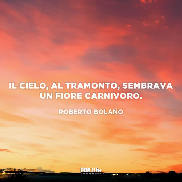 Frase Bolano Tramonto su panorama naturalistico