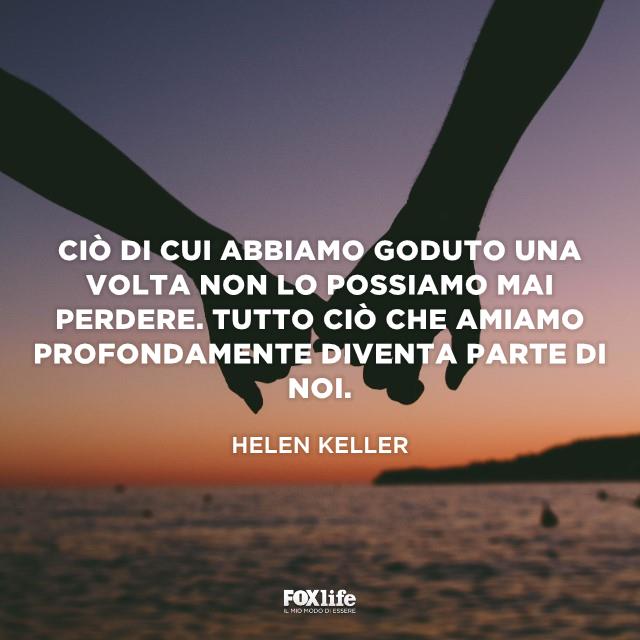 Citazione Keller Mano di donna e uomo unite in penombra