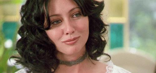 Shannen Doherty Shannen Doherty recita in Streghe con i capelli mossi