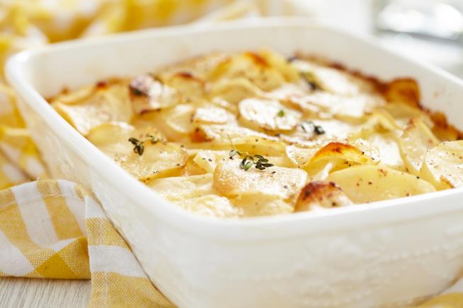 Patate filanti al forno con formaggio Patate filanti al forno