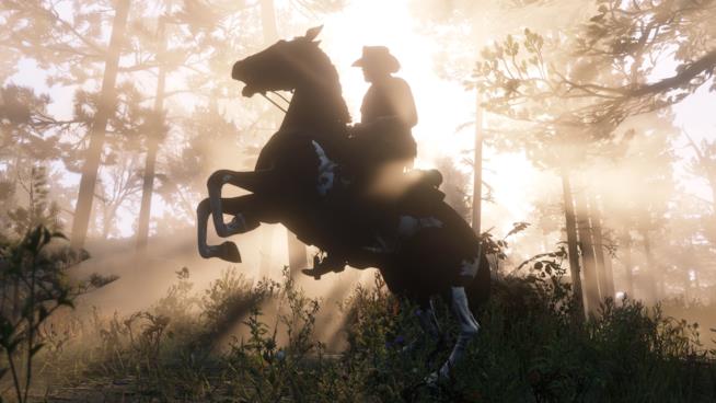 Red Dead Redemption 2, ancora un video gameplay da Rockstar Games Un suggestivo tramonto a cavallo in Red Dead Redemption 2