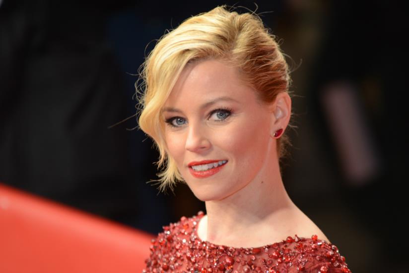 Elizabeth Banks accusa Spielberg di non inserire ruoli femminili di spessore nei suoi film, ma poi si scusa. Il sorriso sensuale dell'attrice Elizabeth Banks