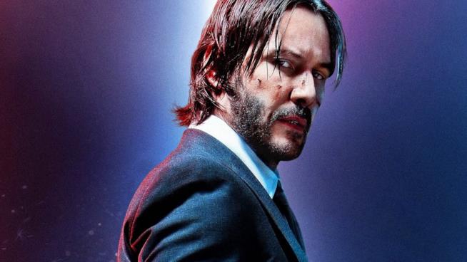 John Wick 3: prima immagini dal magazine EW Un primo piano di John Wick nel poster del secondo capitolo della serie