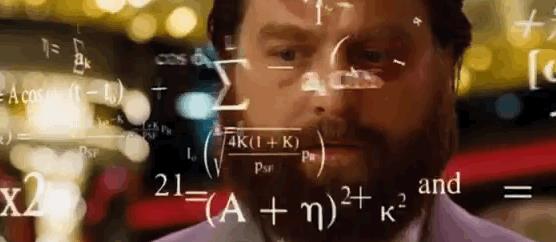GIF con formule di matematica GIF ironica con il volto di un uomo avvolto da formule di matematica