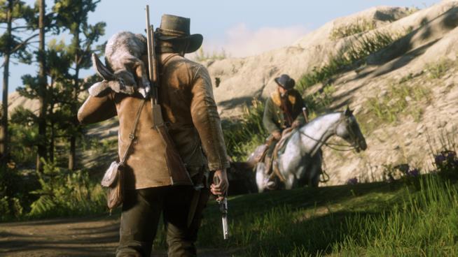 RDR2, la Beta di Red Dead Online si aggiorna il 26 febbraio: le novità Arthur Morgan a caccia in Red Dead Redemption 2