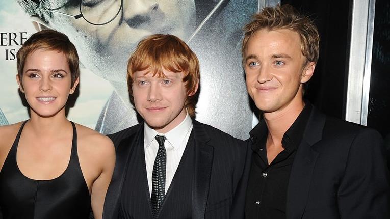 Secondo Rupert Grint c'erano scintille tra Emma Watson e Tom Felton Emma Watson, Rupert Grint e Tom Felton