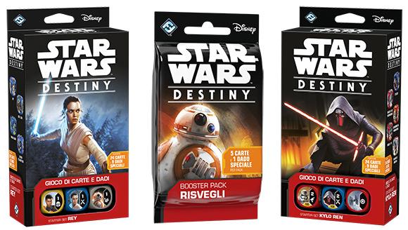 Star_Wars_Destiny Le confezioni di Rey e Kylo Ren di Star Wars Destiny, insieme a un booster pack.